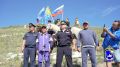 По инициативе МВД по Республике Тыва на горе Догээ развернули флаги России и Тувы